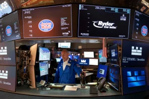 US stocks rise to finish a wild July as Amazon soars, Apple sinks and inflation worries worsen