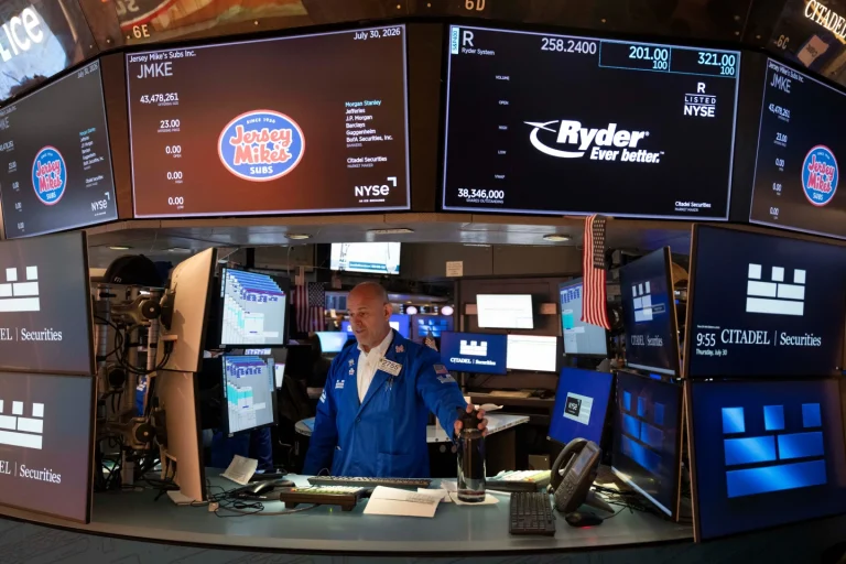US stocks rise to finish a wild July as Amazon soars, Apple sinks and inflation worries worsen